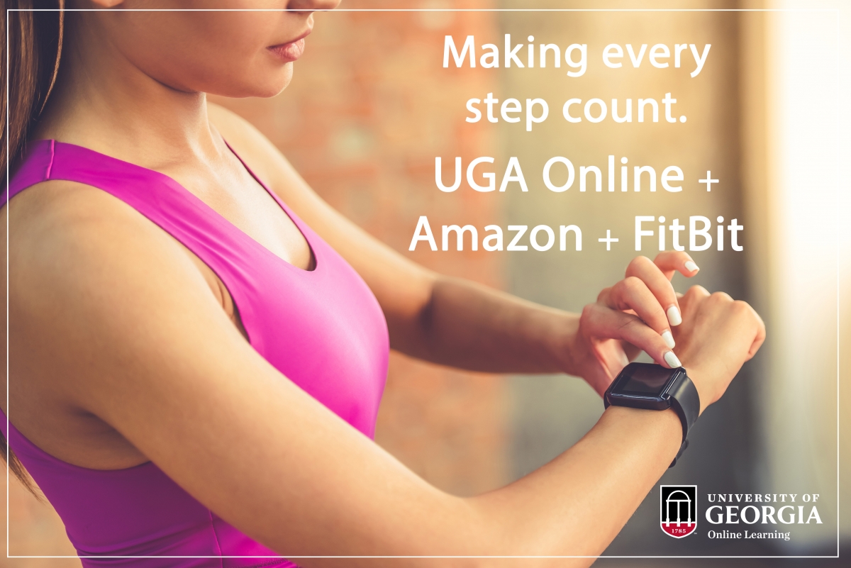 woman checking FitBit. UGA online, Amazon, and fitbit