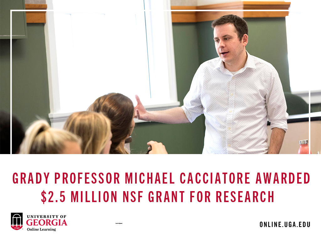 Michael Cacciatore, who was awarded $2.5 million grant for research, teaching to his class.