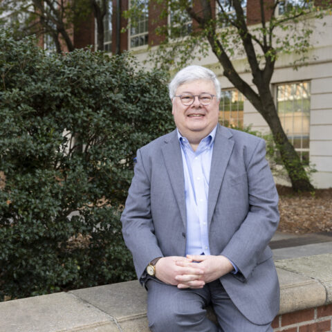 John Maltese, SPIA Associate Dean and University Professorship award recipient, poses for a portrait outside Baldwin Hall.