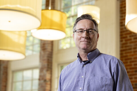 Portrait of Tony Mallon in the Social Work building.