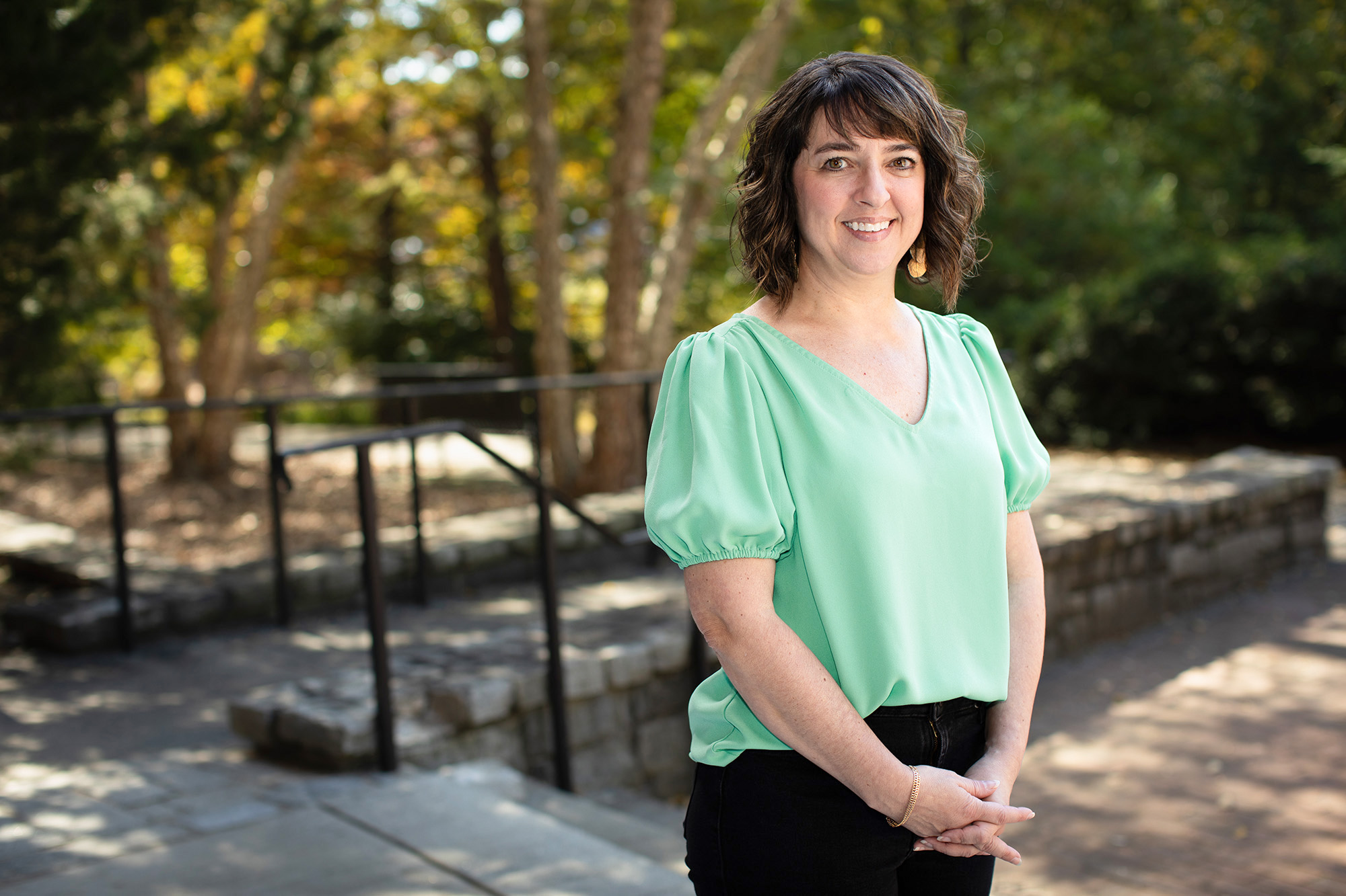 Christina Hanawalt stands outside on UGA's campus