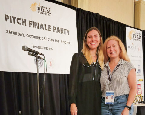 Tricia Horvath (right) poses on stage before giving her pitch. (Photo courtesy of Tricia Horvath.)