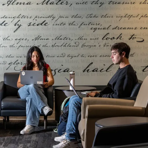 Undergraduate students studying on laptops at the Tate Student Center. (Photo by Dorothy Kozlowski/UGA)