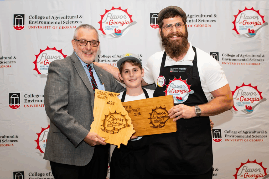 Papa Mountain won the grand prize at the 2026 Flavor of Georgia food product competition for its Garlic and Herb Bread Rolls. Pictured from left are CAES Dean and Director Nick T. Place, Everett Cohen and Solomon Cohen.