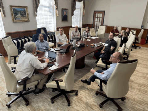 UGA MS-ADS Program's Inaugural Advisory Board sits around a meeting table in Bishop Hall