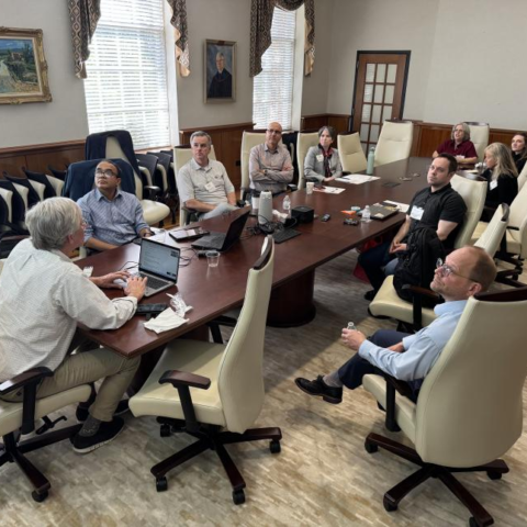 UGA MS-ADS Program's Inaugural Advisory Board sits around a meeting table in Bishop Hall