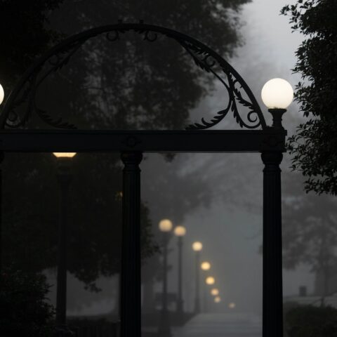 A view of the Arch on a dark foggy winter morning.